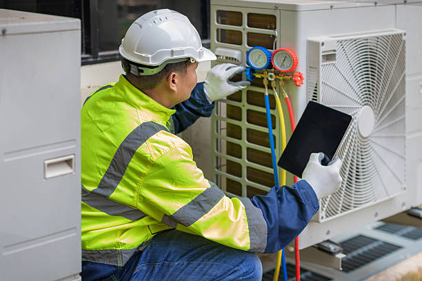 Professional Heat Pump Repair technician working in Smithville, TN